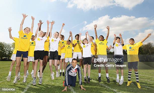 Jessica Ennis poses with young athletes during the the Aviva Elevating Athletics Fund Launch at Gumley House School on April 22, 2010 in Isleworth,...