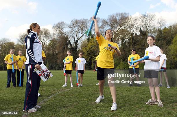 Jessica Ennis watches young athletes during the the Aviva Elevating Athletics Fund Launch at Gumley House School on April 22, 2010 in Isleworth,...