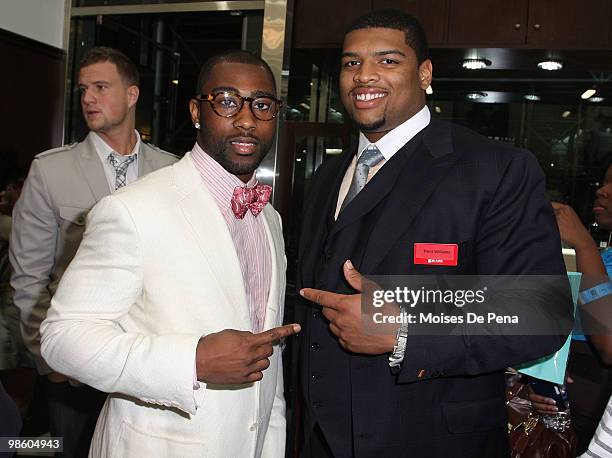 Darrelle Revis of the New York Jets and Trent Williams attends the NFL Draft grand opening celebration at Rafaello & Co Jewelers on April 21, 2010 in...