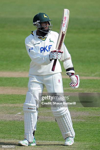 Hashim Amla of Nottinghamshire reaches his fifty during the LV County Championship match between Nottinghamshire and Somerset at Trent Bridge on...