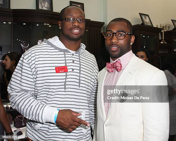 Gerald McCoy and NY Jets star Darrelle Revis attend the NFL Draft grand opening celebration at Rafaello & Co Jewelers on April 21, 2010 in New York...