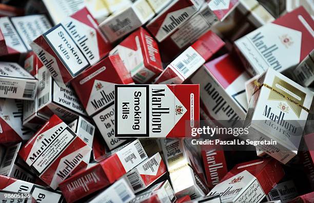 Counterfeit cigarettes seized by Customs are displayed outside Ministere des Finances on April 22, 2010 in Paris, France. France's Budget Minister,...