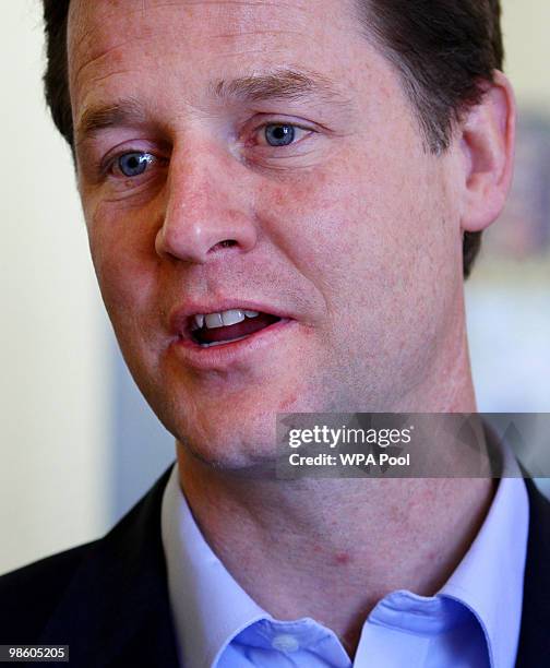 Liberal Democrat Leader Nick Clegg talks to members of a parent and toddler group during a General Election campaign visit to the Community Church at...