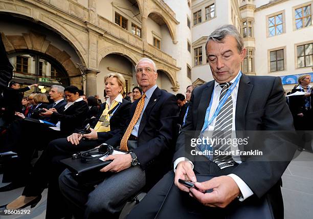 Franz Beckenbauer, chairman of the FIFA U20 and U17 Women's World Cup Committee sits next to Helma Orosz, mayor of Dresden and Wolfgang Niersbach,...