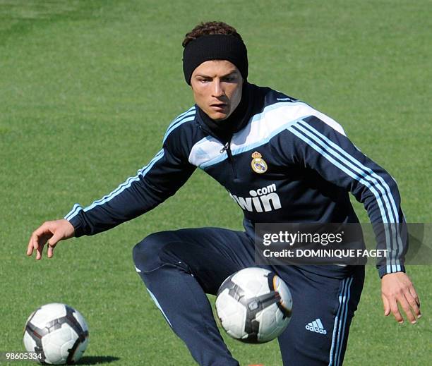 Real Madrid football club's Portuguese forward Cristiano Ronaldo trains in Madrid on April 2, 2010. Barcelona and Real Madrid, who are locked at the...