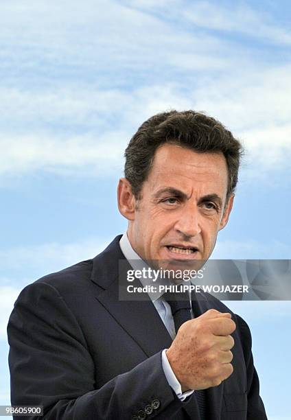 French President Nicolas Sarkozy delivers a speech for the openning of a solar plant in Saint-Pierre de La Reunion island on January 19, 2010 for an...