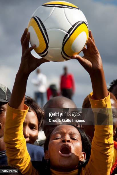 Soccer supporters take part in celebrations marking the 50 Day Countdown to the start of the FIFA 2010 World Cup on April 21, 2010 in Kimberley,...