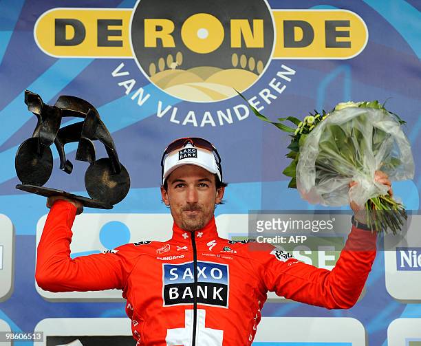 Winner Swiss Fabian Cancellara of team Saxo Bank celebrates on the podium after the 94th edition of the 261km Tour of Flanders one-day classic, from...