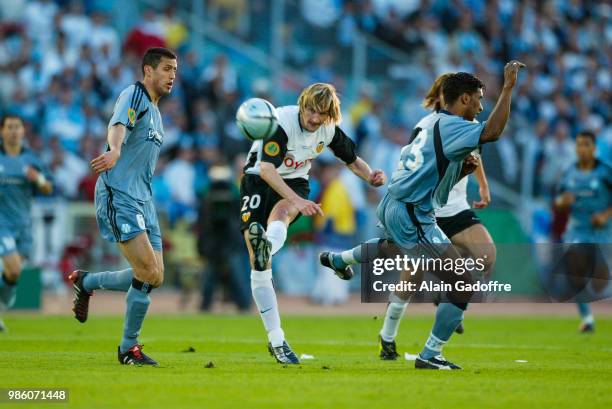 Mista of Valencia, Brahim Hemdani of Marseille and Habib Beye of Marseille during the Uefa cup final match between Valencia and Marseille at Ullevi,...