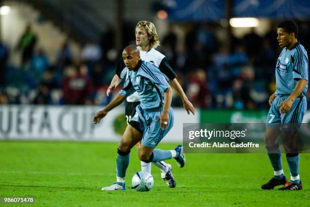 Manuel Dos Santos of Marseille and Mista of Valencia during the Uefa cup final match between Valencia and Marseille at Ullevi, Goteborg, Sweden on...