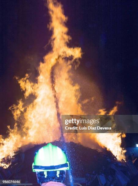 2018 festivities of saint juan - fireman fighting fire - silva v diaz stock pictures, royalty-free photos & images