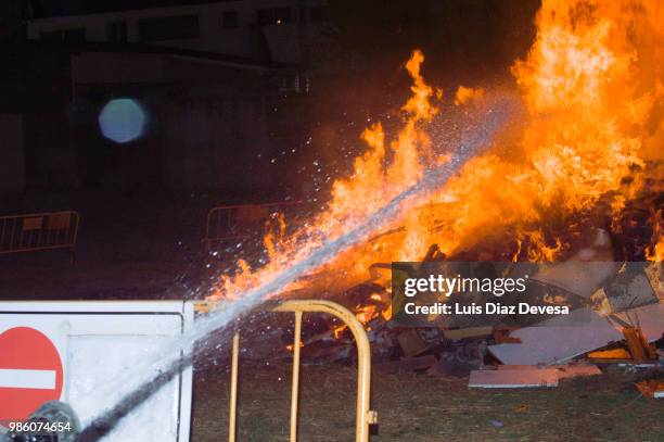 2018 festivities of saint juan - fireman fighting fire - silva v diaz stock pictures, royalty-free photos & images