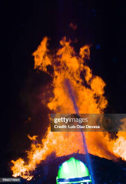 2018 festivities of saint juan - fireman fighting fire - silva v diaz stock pictures, royalty-free photos & images