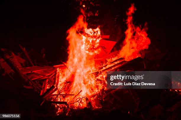 2018 festivities of saint juan - fireman fighting fire - silva v diaz stock pictures, royalty-free photos & images