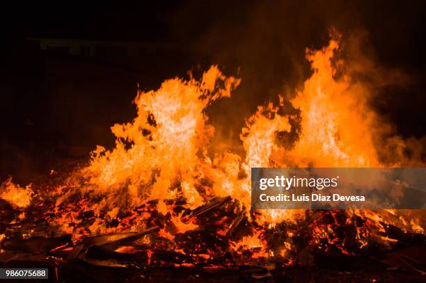 2018 festivities of saint juan - fireman fighting fire - silva v diaz stock pictures, royalty-free photos & images