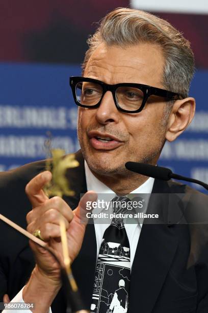Actor Jeff Goldblum sits on the panel during the press conference of the film 'Isle of Dogs' during the Berlinale International Film Festival in...