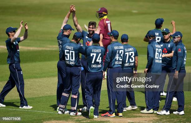 Reece Topley of England Lions celebrates with teammates after dismissing Jermaine Blackwood of West Indies A during the Tri-Series International...