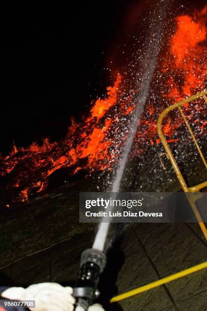 2018 festivities of saint juan - fireman fighting fire - silva v diaz stock pictures, royalty-free photos & images