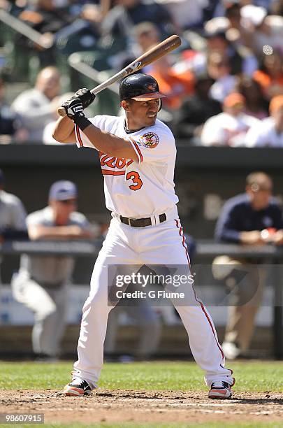 Cesar Izturis of the Baltimore Orioles bats against the Tampa Bay Rays on April 14, 2010 at Camden Yards in Baltimore, Maryland.