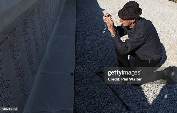 New Zealand war veteran Morris Johnstone photographs the name of his uncle Private Roy Johnstone onto the memorial at Chunuk Bair honouring New...