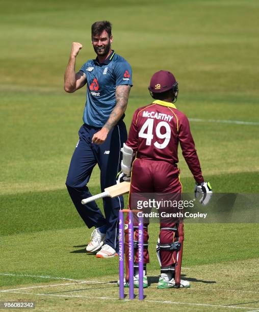 Reece Topley of England Lions celebrates dismissing Andre McCarthy of West Indies A during the Tri-Series International match between England Lions v...