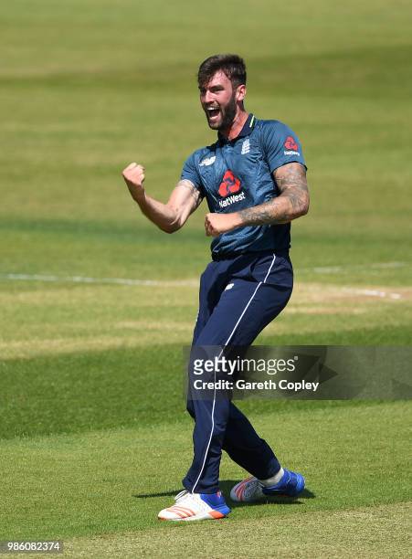 Reece Topley of England Lions celebrates dismissing Andre McCarthy of West Indies A during the Tri-Series International match between England Lions v...