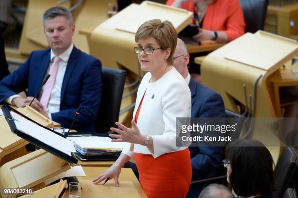 Scotland's First Minister Nicola Sturgeon speaking during First Minister's Questions in the Scottish Parliament, on June 28, 2018 in Edinburgh,...
