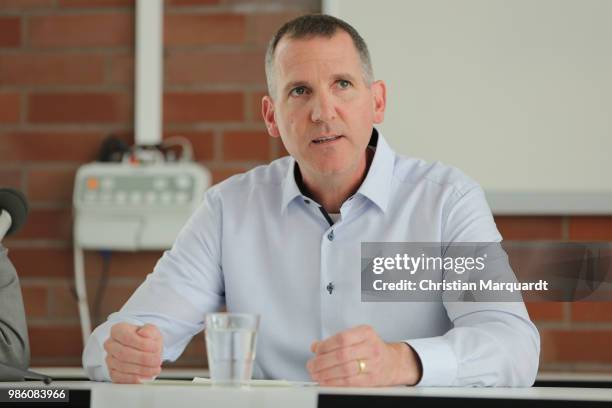 Managing Director JFKS Brian L. Salzer speaks to the media during a press conference on June 28, 2018 in Berlin, Germany. The school has garnered...