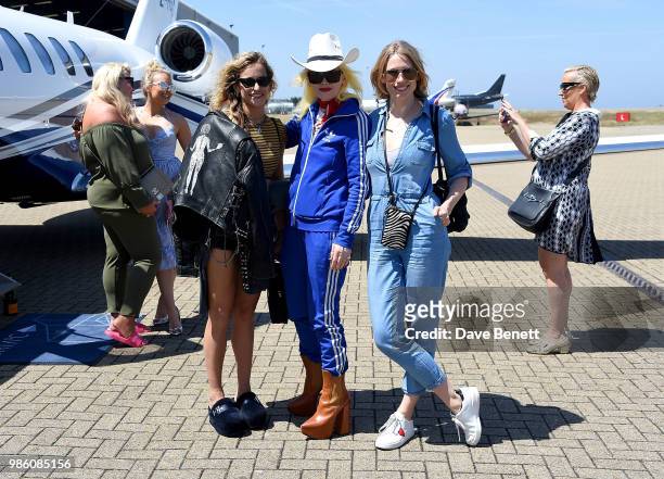 Alice Dellal, Pam Hogg and Tuuli Shipster arrive at Jersey Airport ahead of the Jersey Style Awards 2018 on June 28, 2018 in Trinity, Jersey.