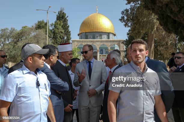 Duke of Cambridge Prince William accompanied by officials of Jerusalems Jordan-run Authority for Islamic Endowments, visits holy sites in occupied...