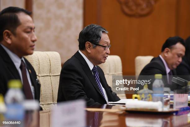 Myanmar's Minister of the Office of the State Counsellor Kyaw Tint Swe speaks during a meeting with Chinese Foreign Minister Wang Yi at the Diaoyutai...