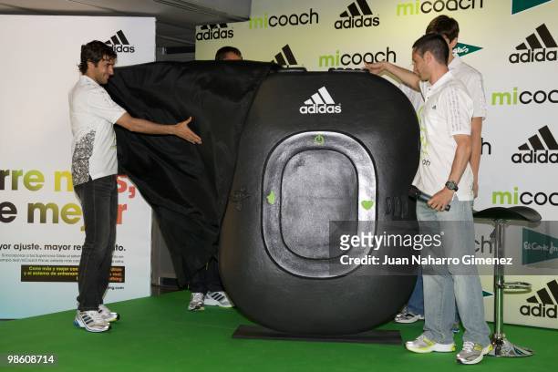 The Spanish soccer player Raul Gonzalez, athlete Arturo Casado, basketball player Carlos Suarez and athlete Rafael Iglesias attend the 'micoach'...