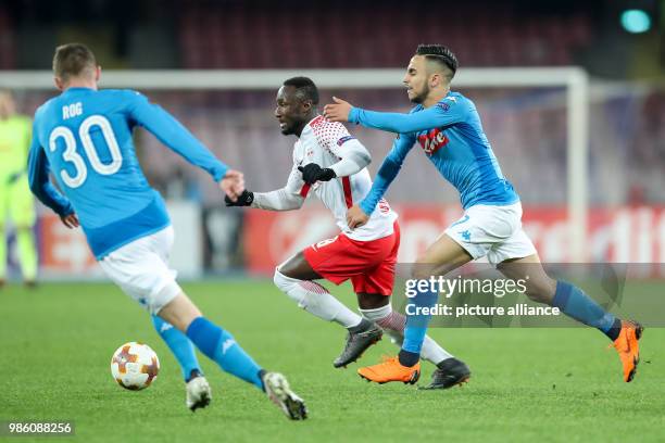 Leipzig's Naby Deco Keita and Naples' Marko Rog and Adam Ounas during the UEFA Europa League soccer match SSC Naples vs RB Leipzig in Naples, Italy,...