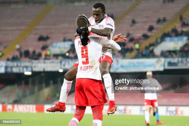 Leipzig's Yussuf Poulsen and Bruma celebrate during the UEFA Europa League soccer match SSC Naples vs RB Leipzig in Naples, Italy, 15 February 2018....