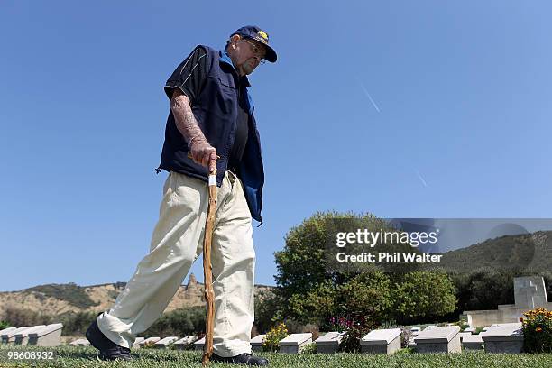 New Zealand war veteran Arthur Dixon walks amongst the graves in the war cemetary at ANZAC Cove for soldiers killed in the First World War on April...