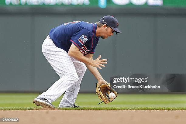 April 14: J.J. Hardy of the Minnesota Twins fields a ball hit by the Boston Red Sox on April 14, 2010 at Target Field in Minneapolis, Minnesota. The...