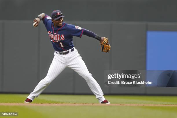 April 14: Orlando Hudson of the Minnesota Twins flelds a ball hit by the Boston Red Sox on April 14, 2010 at Target Field in Minneapolis, Minnesota....