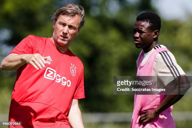 Assistent trainer Richard Witschge of Ajax, Hassane Bande of Ajax during the Training Ajax at the Sportplatz Klosterpforte on June 28, 2018 in...