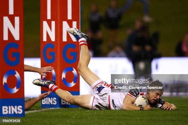 Matt Dufty of the Dragons scores the winning try during the round 16 NRL match between the St George Illawarra Dragons and the Parramatta Eels at WIN...