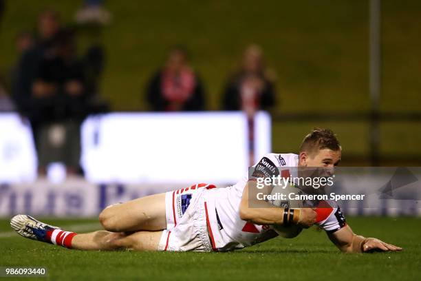 Matt Dufty of the Dragons scores the winning try during the round 16 NRL match between the St George Illawarra Dragons and the Parramatta Eels at WIN...