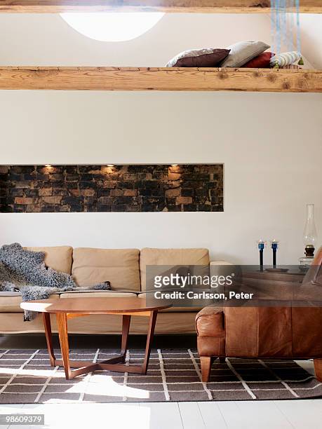 a living-room, sweden. - bear skin rug stock pictures, royalty-free photos & images