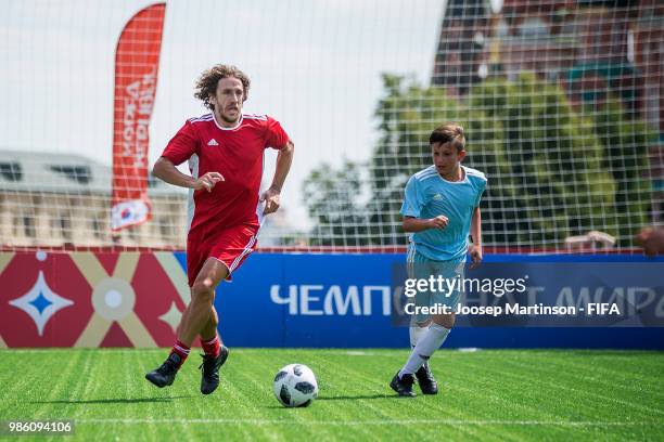 Carles Puyol runs with the ball during a Football Event at Red Square on June 28, 2018 in Moscow, Russia.