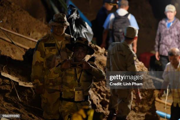 Rescuers take photos inside Tham Luang Nang Non cave on June 28, 2018 in Chiang Rai, Thailand. Rescuers battle heavy rain in northern Thailand as...