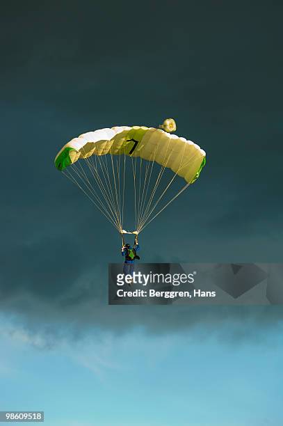 parachute jumper in the sky, sweden. - ウップランド ストックフォトと画像
