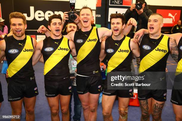 Dan Butler of the Tigers, Jason Castagna of the Tigers, Jack Riewoldt of the Tigers, Trent Cotchin of the Tigers, and Dustin Martin of the Tigers...