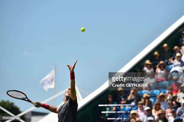 Britain's Cameron Norrie serves to Slovakia's Lukas Lacko during their Men's singles quarter final match at the ATP Nature Valley International...
