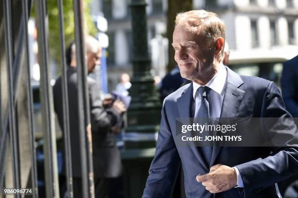 European Council President Donald Tusk arrives for a meeting of the conservative European People's Party , on June 28, 2018 in Brussels.