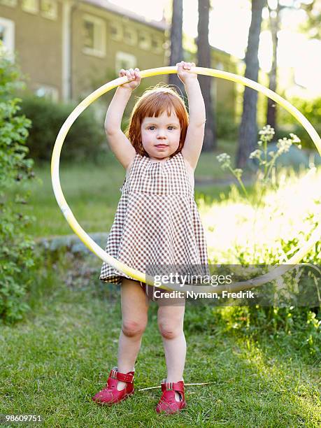 portrait of a little girl, sweden. - フープ ストックフォトと画像