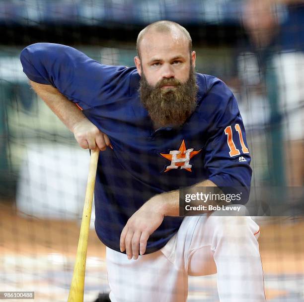 Evan Gattis of the Houston Astros waits his turn during batting practice at Minute Maid Park on June 25, 2018 in Houston, Texas.