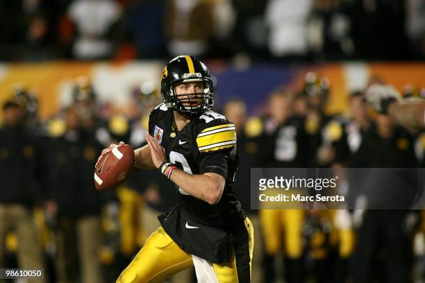 Quarterback Richy Stanzi of the Iowa Hawkeyes rolls out of the pocket against the Georgia Tech Yellow Jackets during the FedEx Orange Bowl at Land...